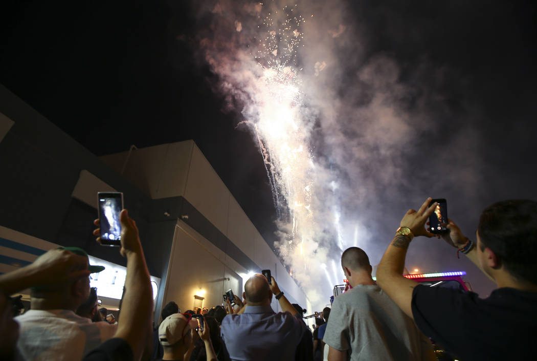 Fireworks go off as customers line up to be some of the first people to legally purchase recreational marijuana at Reef Dispensaries in Las Vegas on Friday, June 30, 2017. Chase Stevens Las Vegas  ...