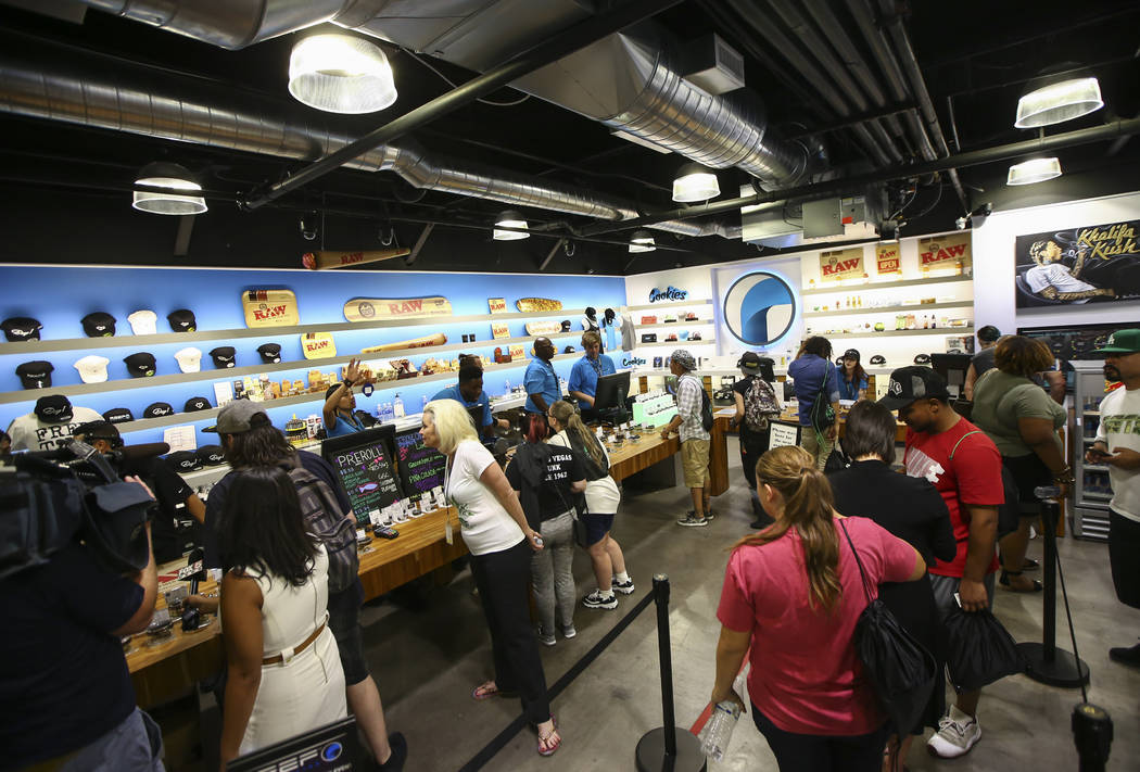 Customers line up to be some of the first to legally purchase recreational marijuana at Reef Dispensaries in Las Vegas on Saturday, July 1, 2017. Chase Stevens Las Vegas Review-Journal @csstevensphoto