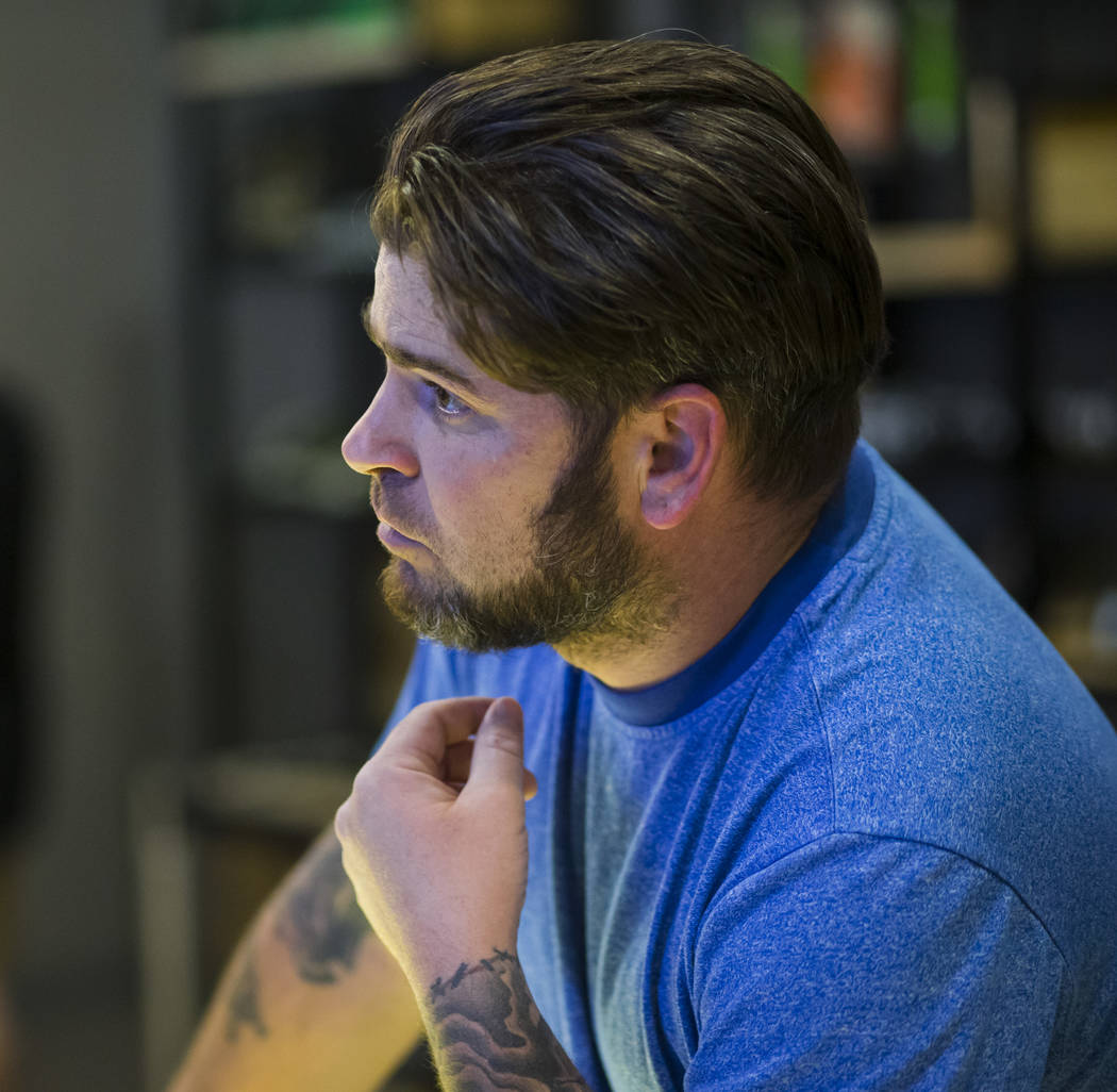 Henderson resident Ethan looks through marijuana products during the first day of recreational sales at Acres Cannabis in Las Vegas on Saturday, July 1, 2017. Chase Stevens Las Vegas Review-Journa ...