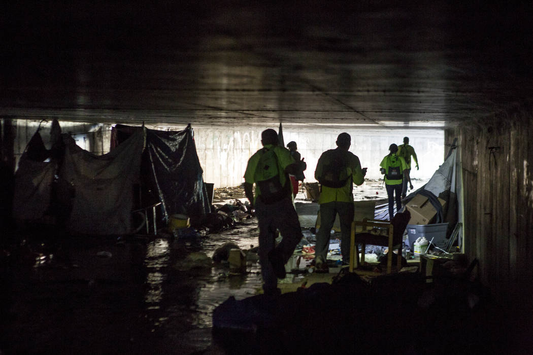 The HELP of Southern Nevada team exits a flood tunnel near the Hard Rock hotel-casino on Tuesday, June 27, 2017.  Patrick Connolly Las Vegas Review-Journal @PConnPie