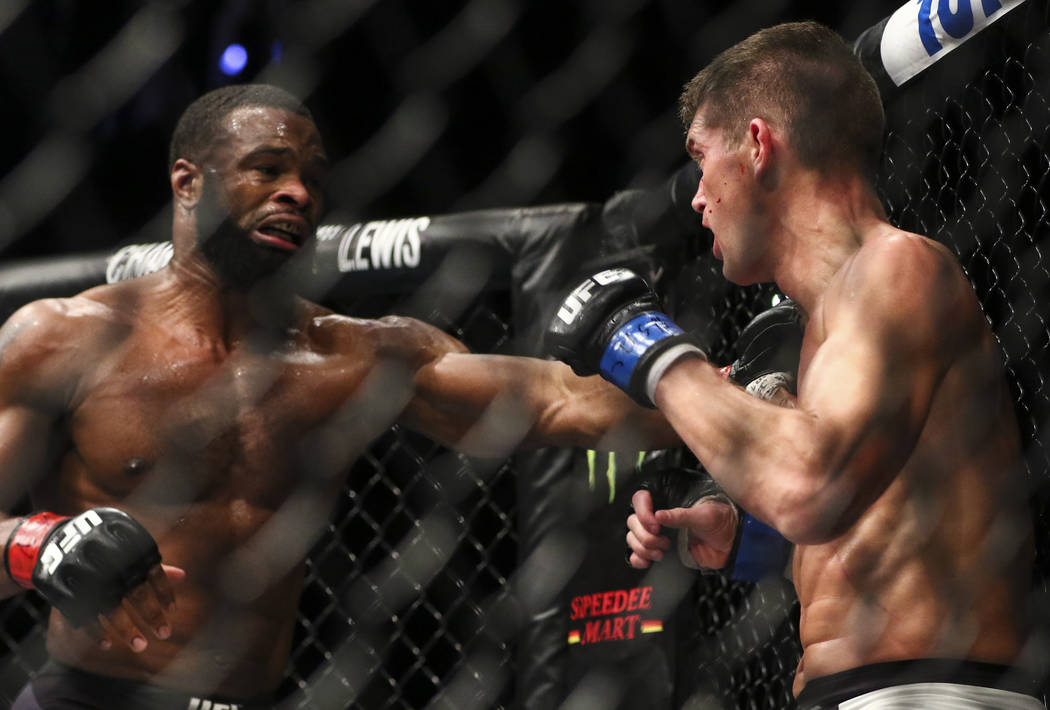 Tyron Woodley of the United States, left, fights Stephen Thompson of the United States during their welterweight title bout at UFC 209 at T-Mobile Arena in Las Vegas on Saturday, March 4, 2017. Wo ...