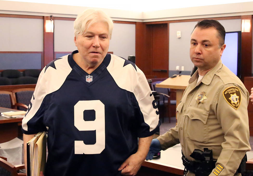 Thomas Randolph, wearing a Tony Romo jersey, leaves the courtroom after appearing in his death penalty phase trial at the Regional Justice Center in Las Vegas on Friday, June 30, 2017. (Bizuayehu  ...