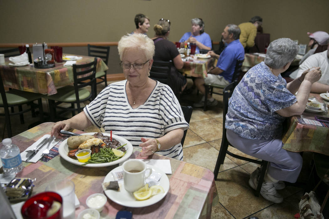 Mabel Mead prepares to dig into her lobster and steak dinner at the Club Fortune Casino in Henderson, Wednesday, June 14, 2017. Gabriella Angotti-Jones Las Vegas Review-Journal @gabriellaangojo