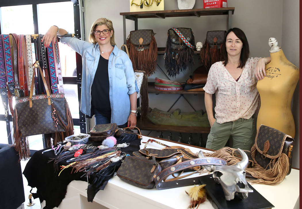 Co-owner of New Vintage, Stephanie Ponder, left, and Tanya Crawford, director of design, display custom purse straps and bags at Ponder's home in Las Vegas on Friday, June 30, 2017. Bizuayehu Tesf ...