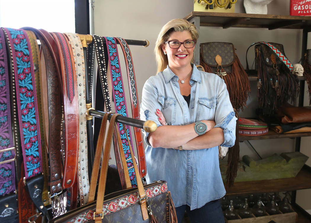 Co-owner of New Vintage, Stephanie Ponder, displays custom purse straps and bags at Tanya Crawford's, director of design, home in Las Vegas on Friday, June 30, 2017. Bizuayehu Tesfaye/Las Vegas Re ...