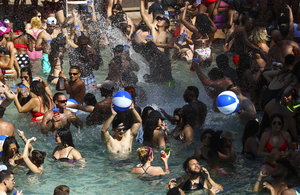 People splash and party in the pool at Rehab dayclub at Hard Rock Hotel in Las Vegas on Saturday, June 24, 2017. (Chase Stevens/Las Vegas Review-Journal) @csstevensphoto