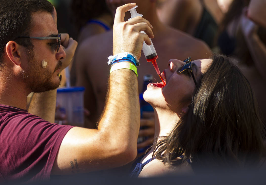 A shot syringe is one of many alcoholic options available at Rehab dayclub at Hard Rock Hotel in Las Vegas on Saturday, June 24, 2017. (Chase Stevens/Las Vegas Review-Journal) @csstevensphoto
