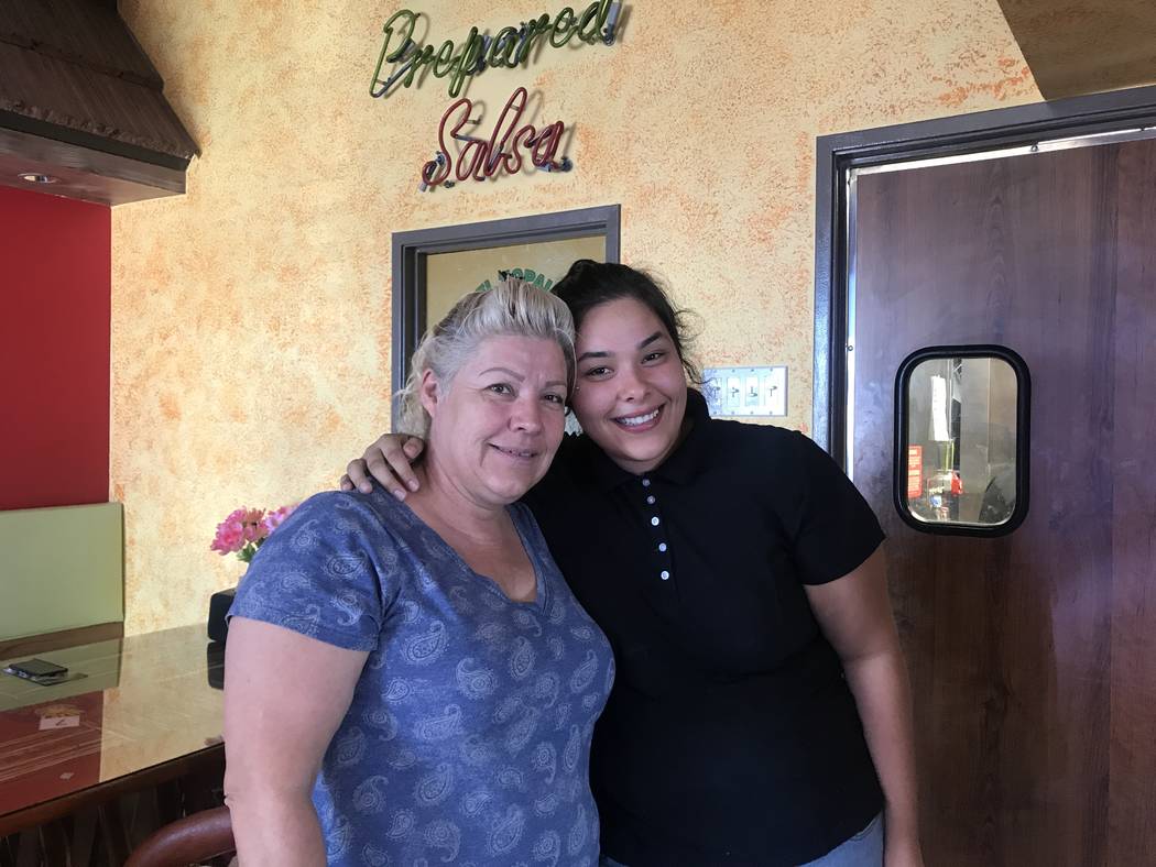 Co-owner Maria Gonzalez and her 20-year-old daughter, Katty Saldana, pose together June 29 at El Nopal Mexican Grill, 955 W Craig Rd #100a. [Kailyn Brown/View) @KailynHype