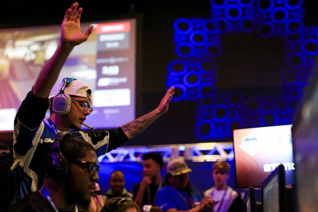 Brandon (Le Le) of G4C esports, top left, reacts to his team winning a game during the Halo World Championship North American Qualifier at thE Arena in downtown Las Vegas on Friday, March 3, 2017, ...