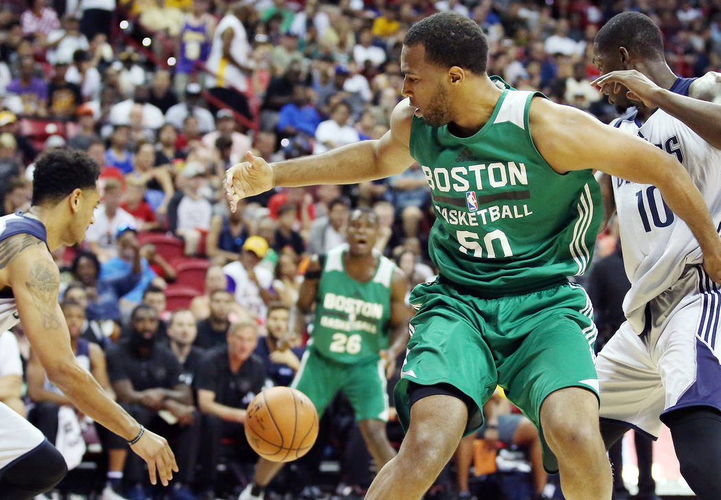 Boston Celtics center Trevor Thompson looses possession of the ball to the Dallas Mavericks during their 2017 NBA Summer League game at Thomas & Mack in Las Vegas on Saturday, July 15, 2017. B ...
