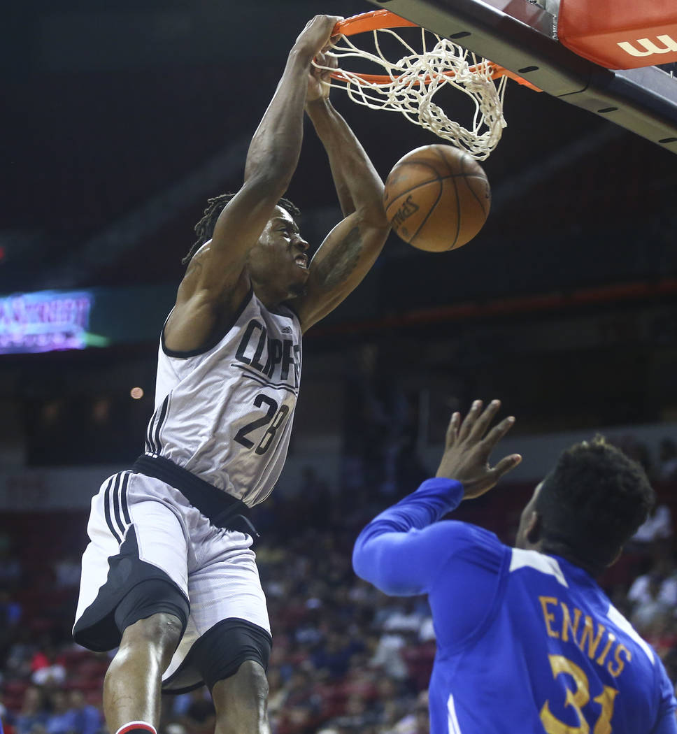 Los Angeles Clippers' Jaron Johnson (28) dunks against the Golden State Warriors during a basketball game at the NBA Summer League at the Thomas & Mack Center in Las Vegas on Friday, July 14, ...