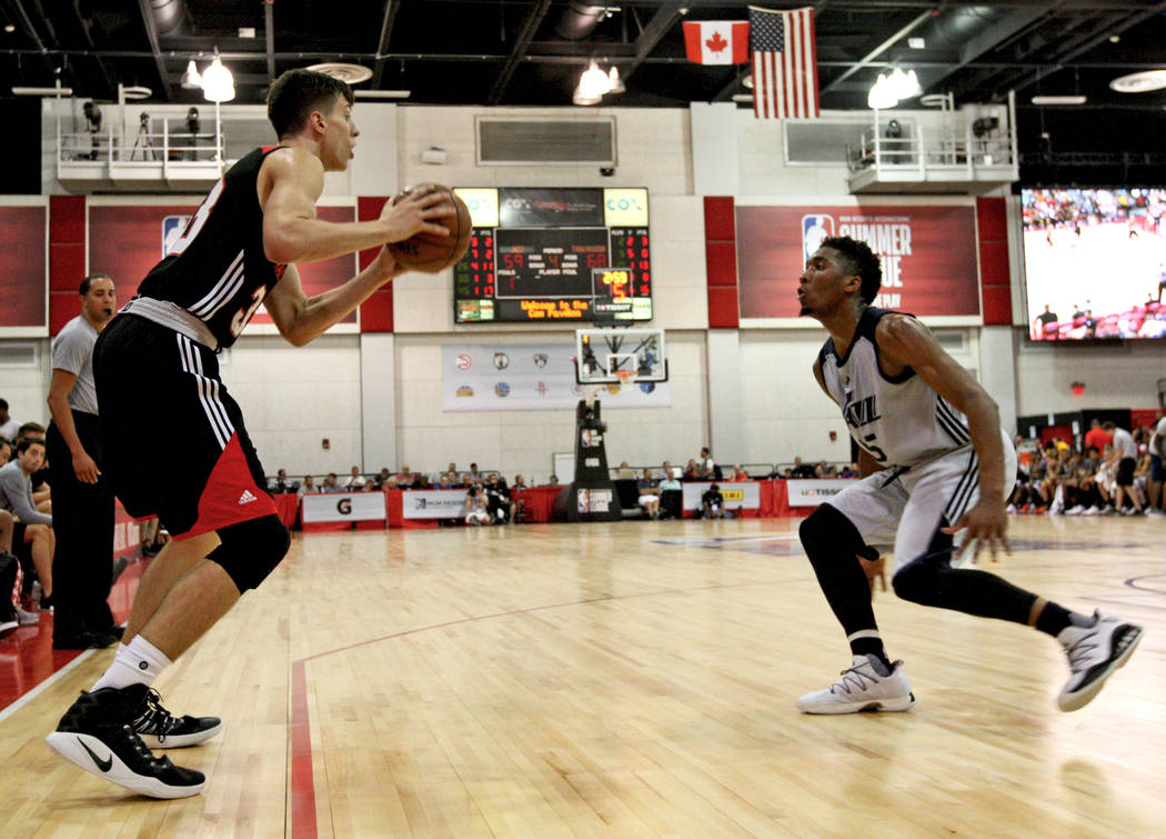 Portland Trail Blazers rookie Zach Collins (33) looks for an opening to pass the ball during the Trail Blazers NBA Summer League game against the Utah Jazz at the Cox Pavilion in Las Vegas on Satu ...