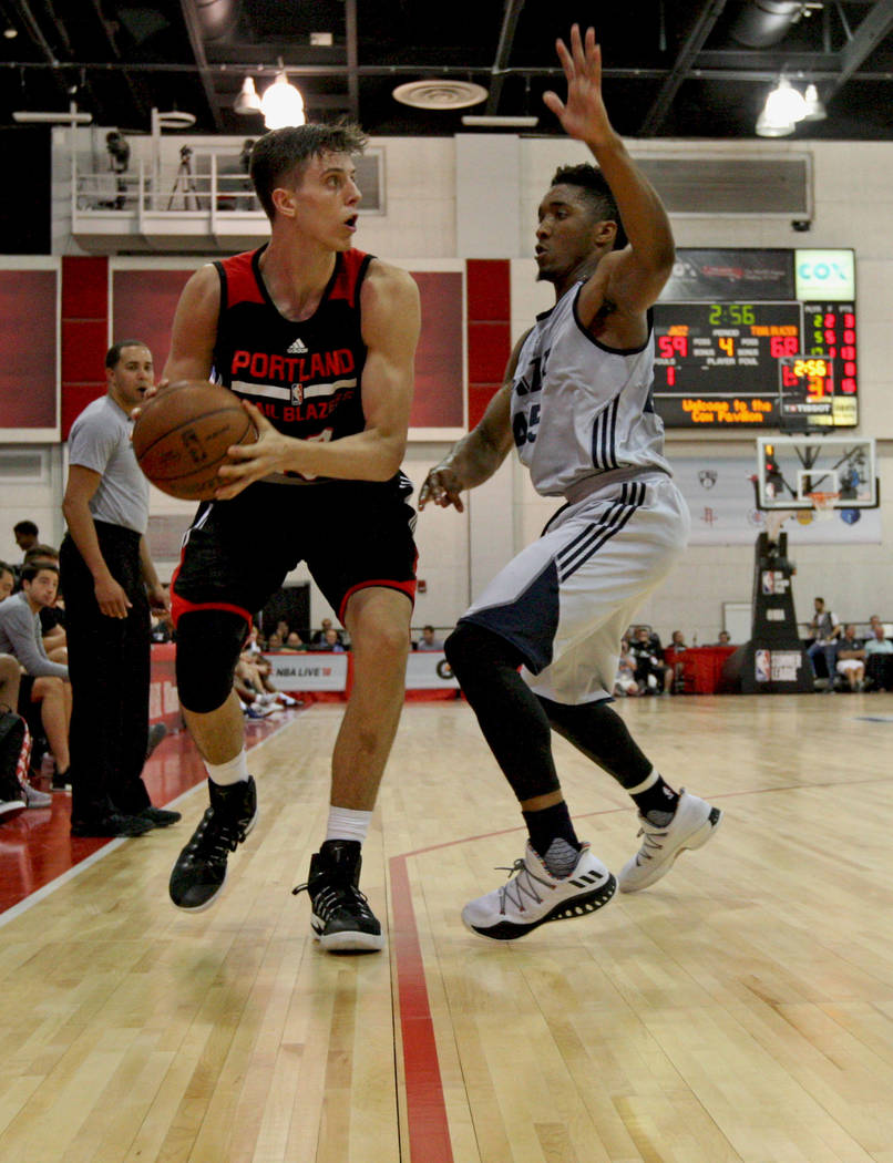 Portland Trail Blazers rookie Zach Collins (33) gets ready to pass the ball during the Trail Blazers NBA Summer League game against the Utah Jazz at the Cox Pavilion in Las Vegas on Saturday, July ...