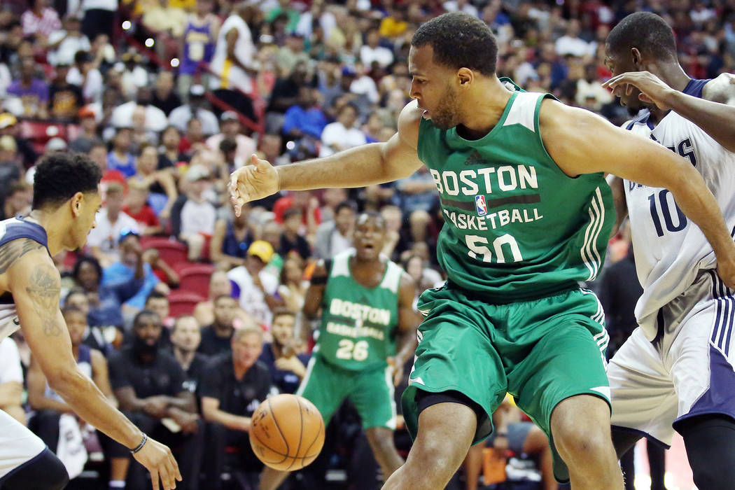 Boston Celtics center Trevor Thompson looses possession of the ball to the Dallas Mavericks during their 2017 NBA Summer League game at Thomas & Mack in Las Vegas on Saturday, July 15, 2017. B ...