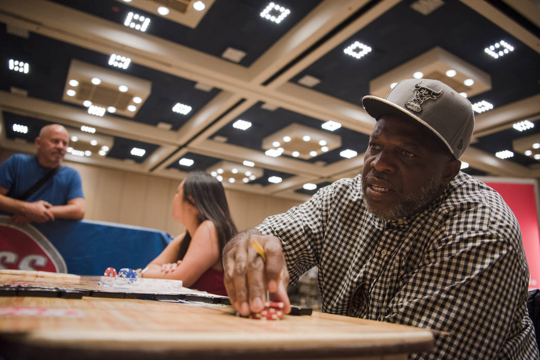 Gary Jackson practices his domino skills at the Summer Slam Domino Tournament hosted by the The Universal Domino League at Westgate hotel-casino on Saturday, July 8, 2017, in Las Vegas. Morgan Lie ...
