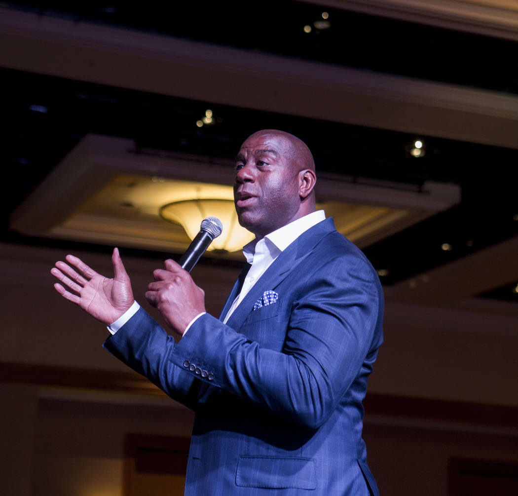 Businessman and former basketball star Earvin "Magic" Johnson delivers the keynote speech for the Professional Beauty Association Business Forum during Cosmoprof North America at ...