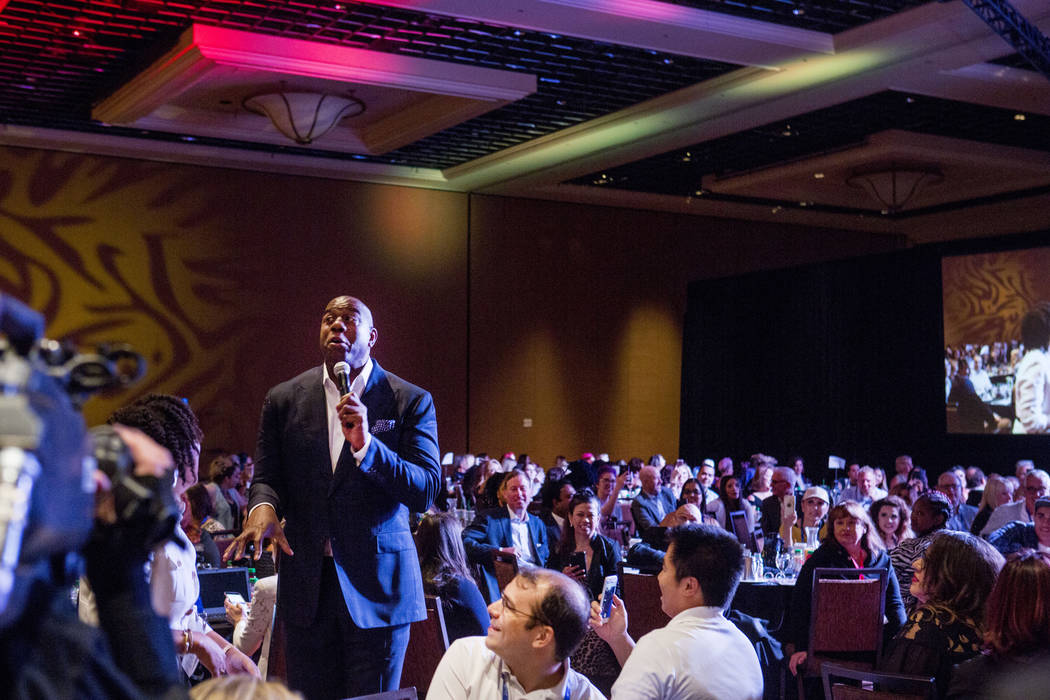 Businessman and former basketball star Earvin &quot;Magic&quot; Johnson delivers the keynote speech for the Professional Beauty Association Business Forum during Cosmoprof North America at ...