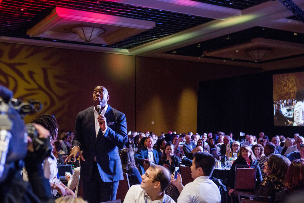 Businessman and former basketball star Earvin "Magic" Johnson delivers the keynote speech for the Professional Beauty Association Business Forum during Cosmoprof North America at ...