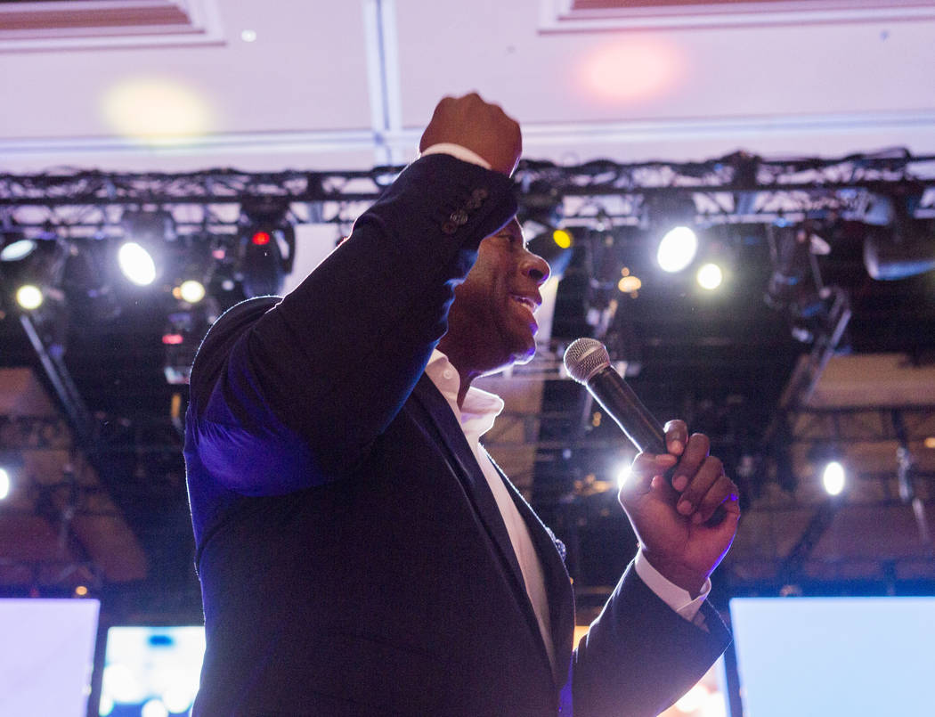 Businessman and former basketball star Earvin "Magic" Johnson delivers the keynote speech for the Professional Beauty Association Business Forum during Cosmoprof North America at ...