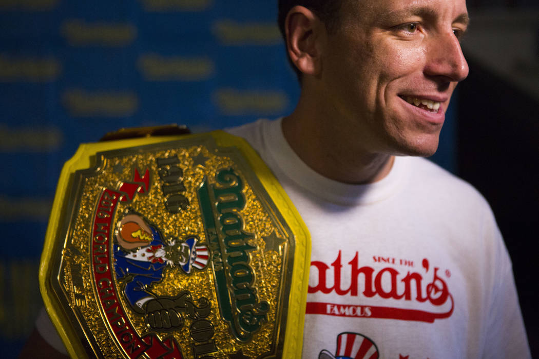 The current world hot dog eating champion, Joey Chestnut speaks to the media after the Nathan's Famous Hotdog eating contest weight in on Monday, July 3, 2017, in Brooklyn, New York. Chestnut weig ...