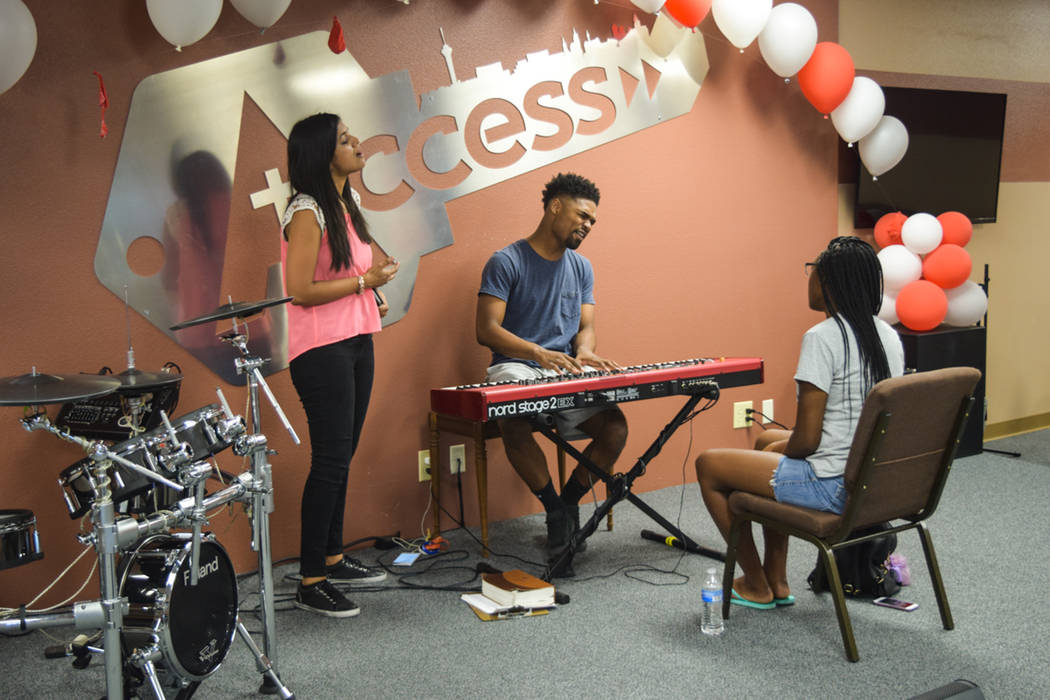 Remnant's director of missionaries, Sherin George, joined in a choir practice with youth member Jasmin Fitch and worship leader Vashawn Nash on July 5. (Alex Meyer/View) @alxmey