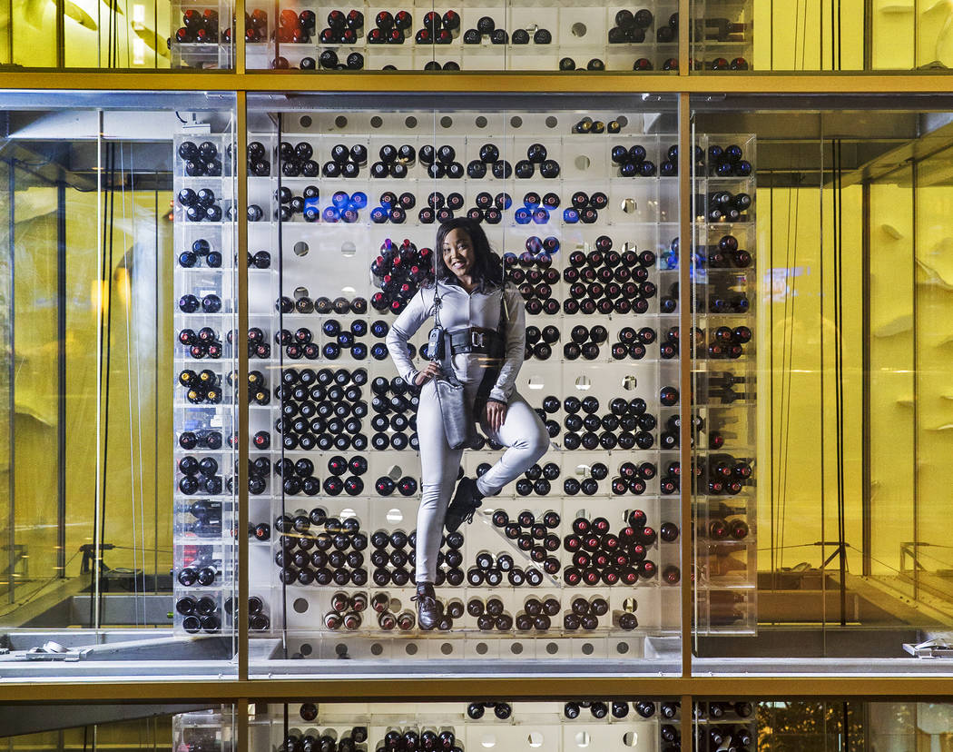 Eboni Lomax has been a wine angel at Aureole for the past 10 years, scaling its four-story wine tower containing close to 3000 bottles. Lomax appeared on an episode of the Oprah Winfrey Show in 20 ...