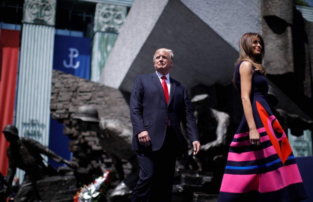 U.S. President Donald Trump walks next to First Lady Melania Trump to give a public speech at Krasinski Square, in Warsaw, Poland July 6, 2017. REUTERS/Carlos Barria     TPX IMAGES OF THE DAY