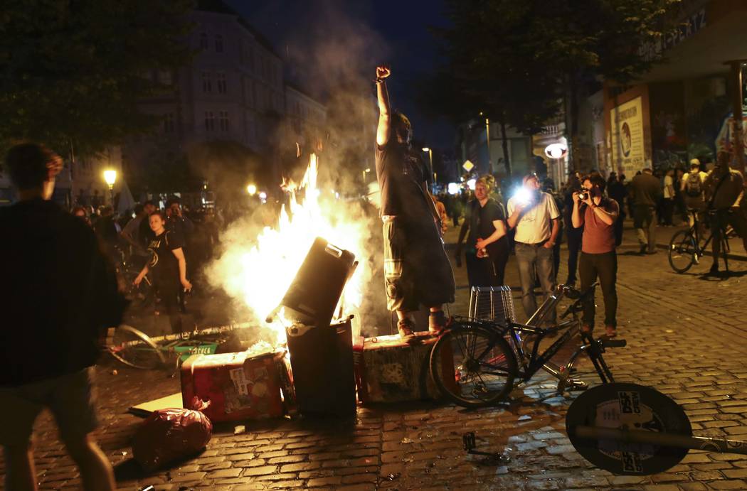 Anti-G20 protesters light garbage in the middle of a road in the Schanze district following clashes with German riot police in Hamburg, Germany, July 6, 2017. REUTERS/Kai Pfaffenbach