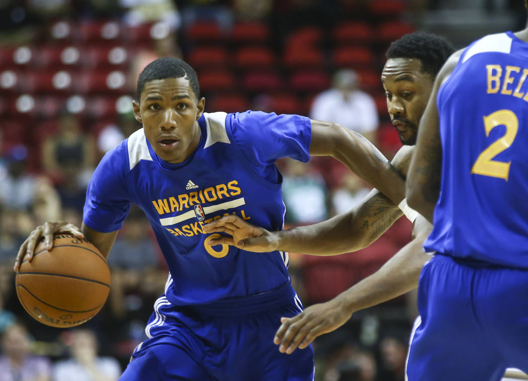 Golden State Warriors' Patrick McCaw (0) drives against the Minnesota Timberwolves during a basketball game at the NBA Summer League at the Thomas & Mack Center in Las Vegas on Tuesday, July 1 ...