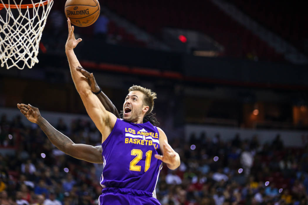 Los Angeles Lakers forward Travis Wear attempts to get the ball in the hoop during the NBA Summer League semifinal game at Thomas and Mack Center on Sunday, July 16, 2017, in Las Vegas. Morgan Lie ...