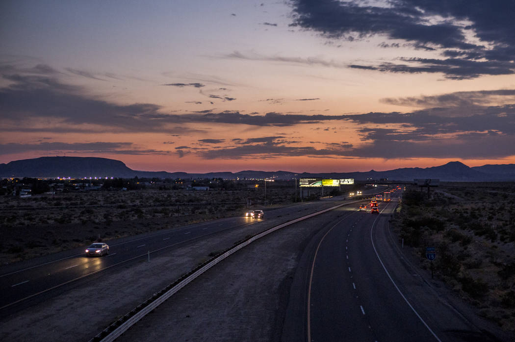 Cars pass by on Interstate 15 at sunset near Yermo, Calif. on Saturday, July 8, 2017.  Patrick Connolly Las Vegas Review-Journal @PConnPie