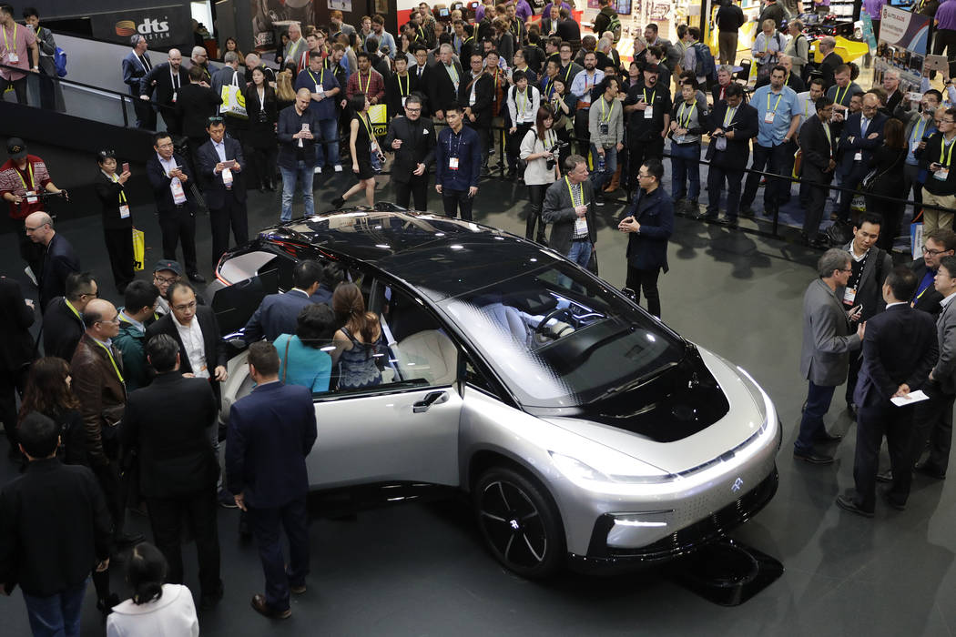 FILE--In this Jan. 3, 2017, file photo, Faraday Future's FF 91 electric car is unveiled during a news conference at CES International in Las Vegas. A contractor is suing upstart electric vehicle c ...
