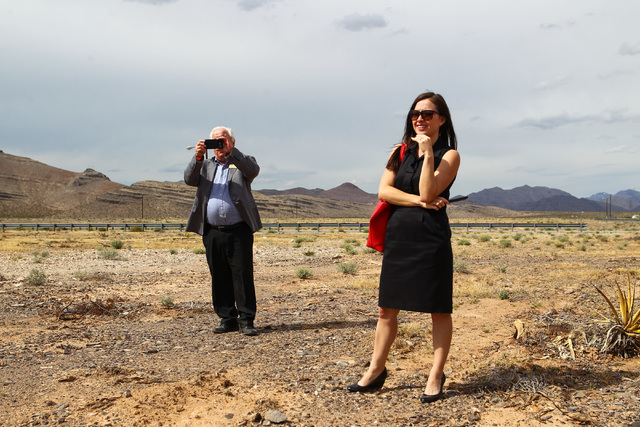 People look on during the groundbreaking for Faraday Future's planned 900-acre manufacturing site in North Las Vegas on Wednesday, April 13, 2016. Chase Stevens/Las Vegas Review-Journal Follow @cs ...