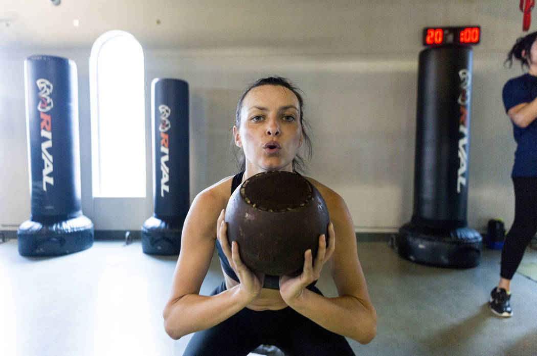 Ivana Stevanovic works out using a kettlebell at TruFusion on Eastern Avenue in Las Vegas, Tuesday, July 10, 2017. (Elizabeth Brumley/Las Vegas Review-Journal)