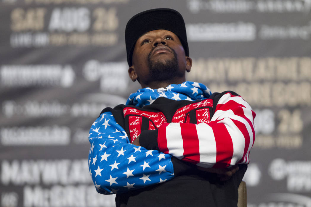 Boxer Floyd Mayweather Jr., during a world tour event stop to promote his upcoming fight against UFC fighter Conor McGregor, at Staples Center in Los Angeles, Calif., on Tuesday, July 11, 2017. Er ...
