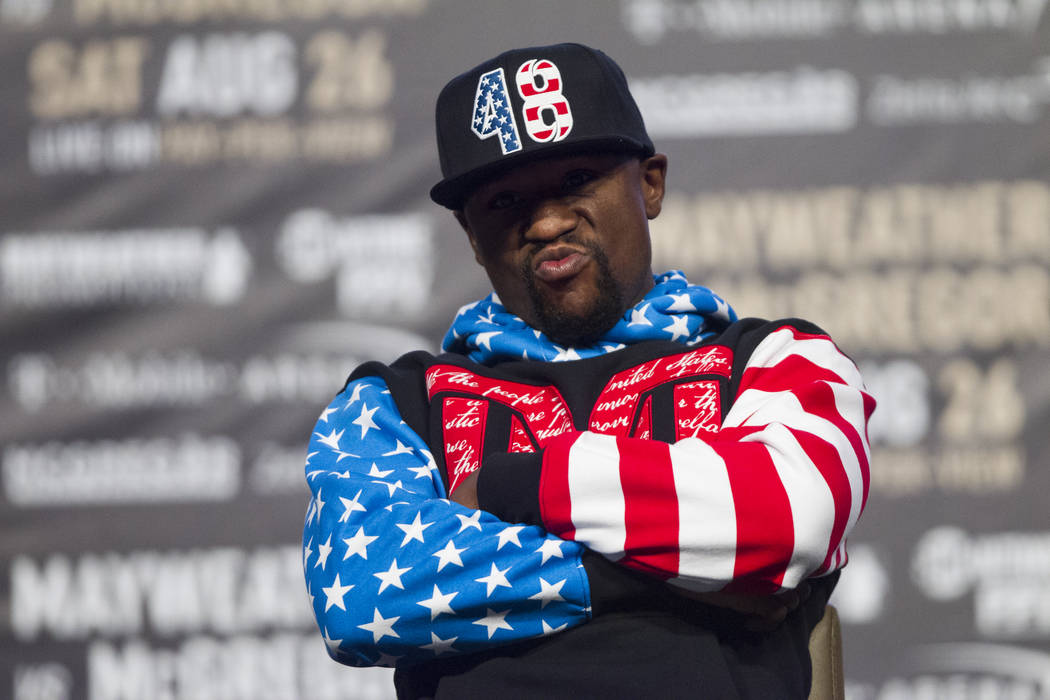 Boxer Floyd Mayweather Jr., during a world tour event stop to promote his upcoming fight against UFC fighter Conor McGregor, at Staples Center in Los Angeles, Calif., on Tuesday, July 11, 2017. Er ...