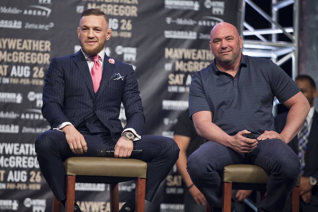 Mixed Martial Artist fighter Conor McGregor, left, and UFC president Dana White during a world tour event stop to promote his upcoming fight against Boxer Floyd Mayweather Jr., at Staples Center i ...