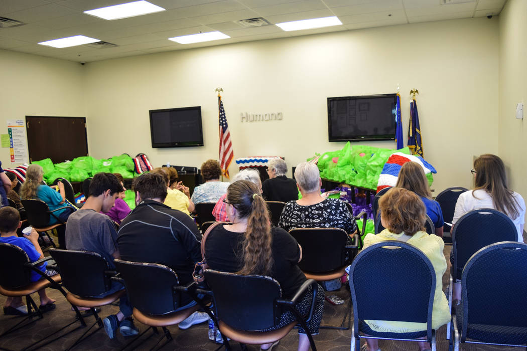Humana Charity Crafters donate quilts, afghans to veterans
