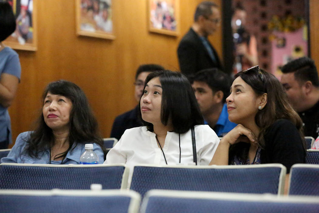 Reniella P. Perez, from left, Amy Irene Salayog and Gina Mejia await orientation on Tuesday, July 11, 2017, with over 70 fellow teachers the Clark County School District brought in from the Philip ...