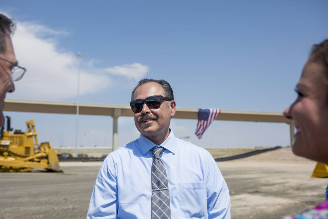 The Nevada Department of Transportation director Rudy Malfabon celebrates the opening of the Centennial Bowl flyover bridge linking westbound 215 Beltway and southbound U.S. Highway 95 in northwes ...