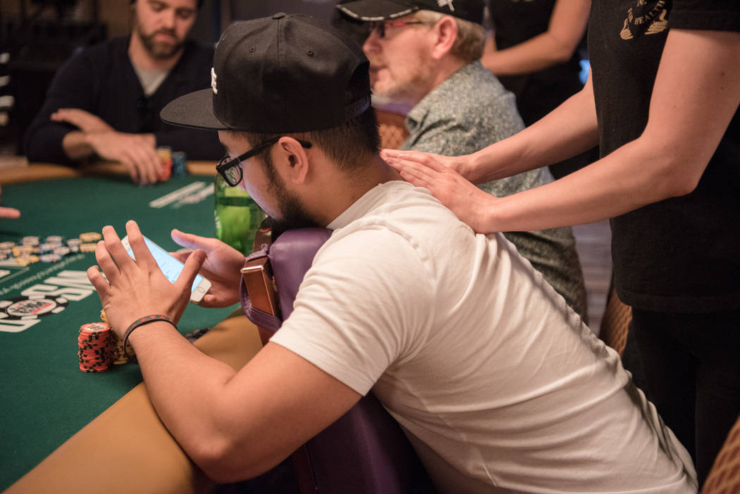 Professional Massage employee Erica Nelson massages Ryan Tosoc at WSOP on Wednesday, July 12, 2017, at Rio Convention Center in Las Vegas. Morgan Lieberman Las Vegas Review-Journal