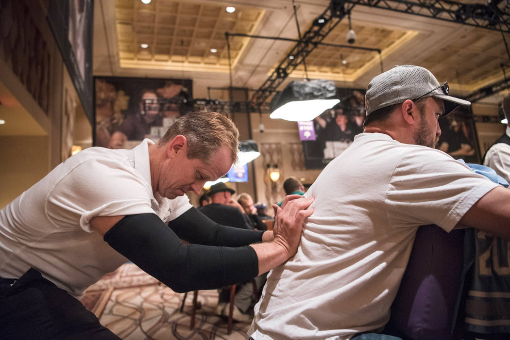 Professional Massage employee Troy Miller gives a massage to Florida resident Daniel Pearlman at WSOP on Wednesday, July 12, 2017, at Rio Convention Center in Las Vegas. Morgan Lieberman Las Vegas ...
