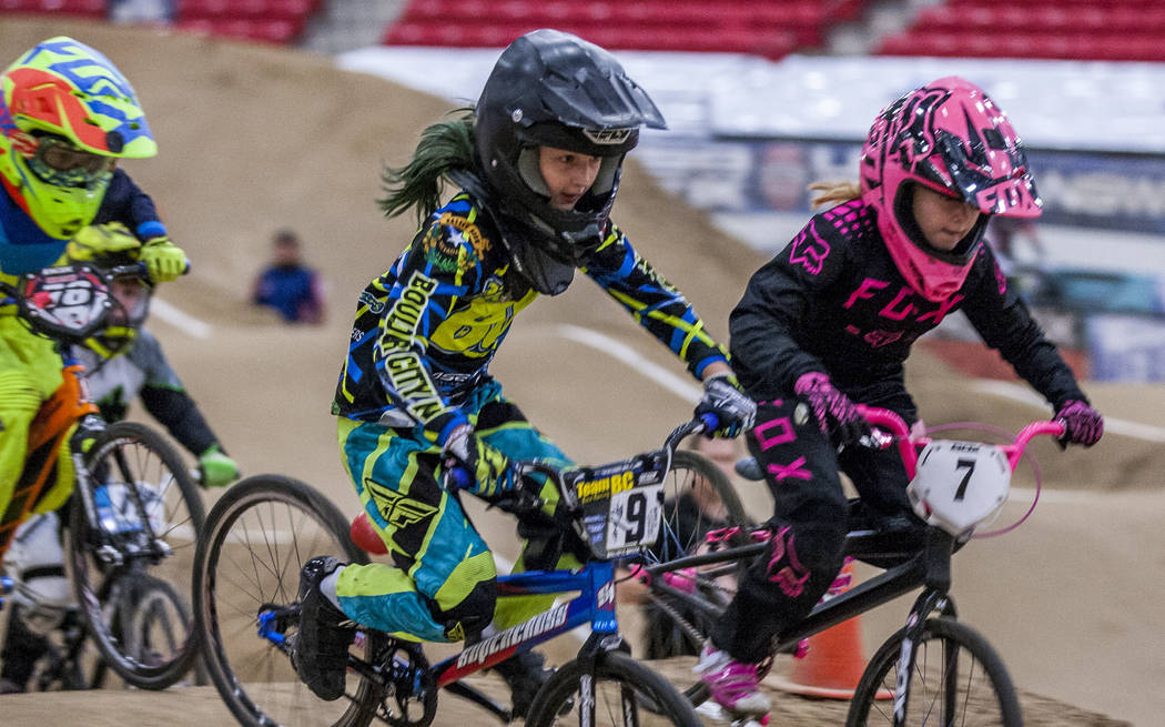 Brooklyn Bowers (9) and Savanna Stokes (7) go head to head during the USA BMX 2017 Las Vegas Nationals at South Point Arena on Sunday, July 16, 2017.  Patrick Connolly Las Vegas Review-Journal @PC ...