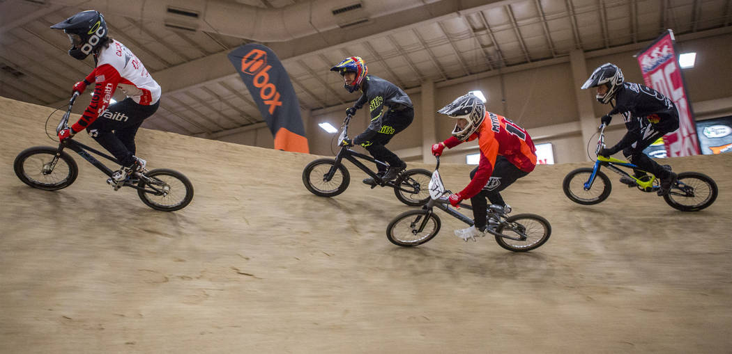 BMX riders make a steep turn during the USA BMX 2017 Las Vegas Nationals at South Point Arena on Sunday, July 16, 2017.  Patrick Connolly Las Vegas Review-Journal @PConnPie