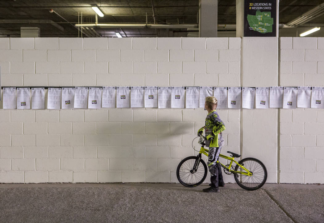 A young BMX rider looks at race times and racer names at the USA BMX 2017 Las Vegas Nationals at South Point Arena on Sunday, July 16, 2017.  Patrick Connolly Las Vegas Review-Journal @PConnPie