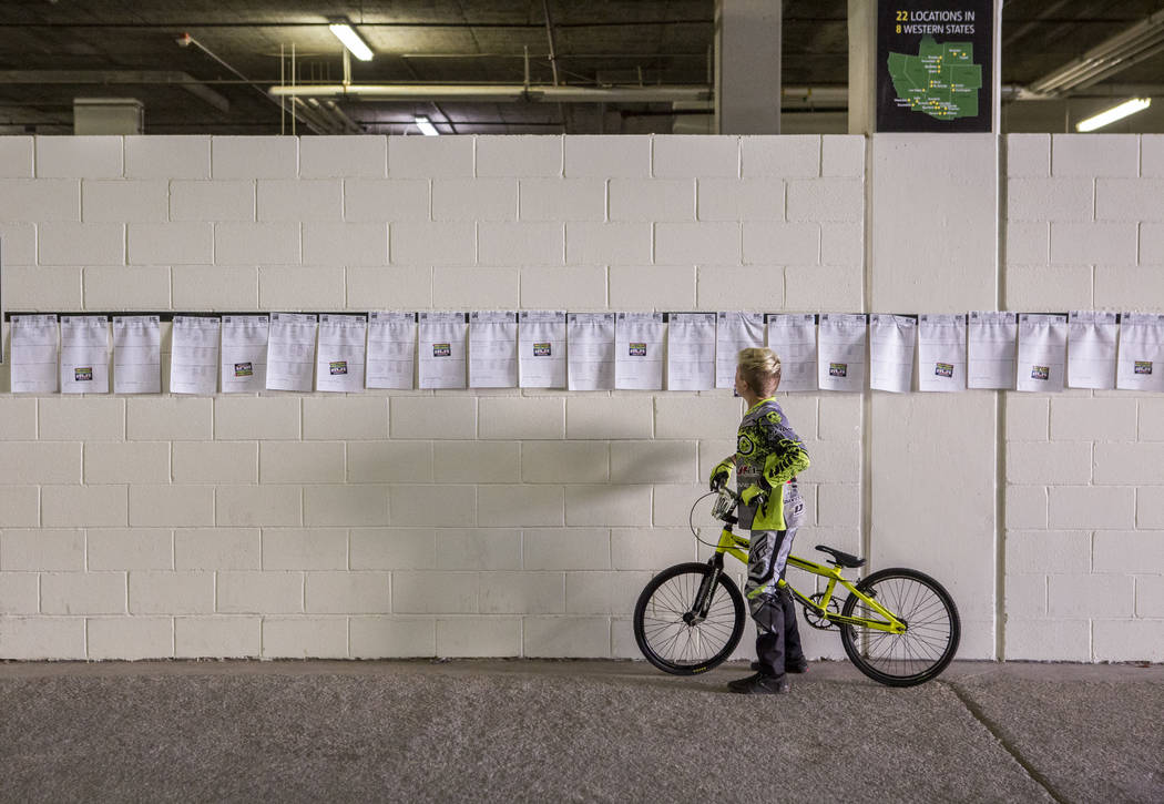 A young BMX rider looks at race times and racer names at the USA BMX 2017 Las Vegas Nationals at South Point Arena on Sunday, July 16, 2017. Patrick Connolly Las Vegas Review-Journal @PConnPie