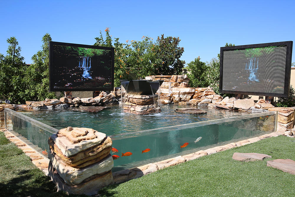 Brett Raymer and Trisha Chamberlain wanted their pond to be in a parklike setting. (Acrylic Tank Manufacturing)