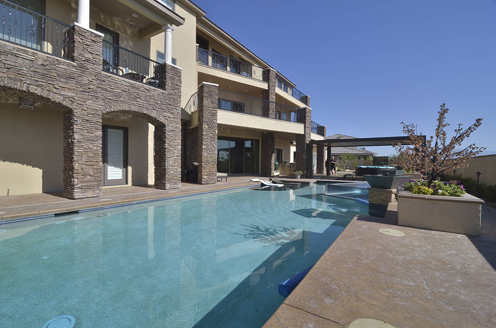 The backyard is shown at the home of Brett Raymer, star of “Tanked” on Animal Planet. (Bill Hughes/Real Estate Millions)