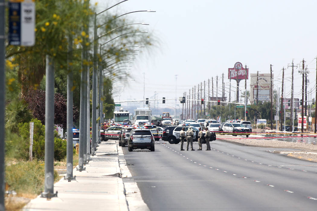 A heavy presence of officers on North Rancho Drive between North Jones Boulevard and West Craig Road where an officer involved shooting occurred on Tuesday, July 11, 2017, in Las Vegas. (Bridget B ...