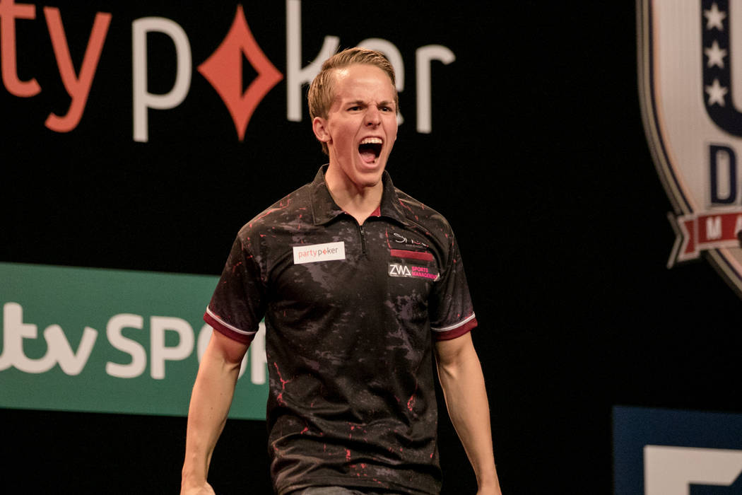 muskel ting udløser Dawson Murschell shows excitement for his winning score in the fourth leg  of the match at the PDC's World Series of Darts Festival at Tropicana  hotel-casino on Friday, July 14, 2017, in